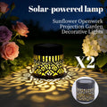 Solar-powered sunflower openwork garden light casting decorative projection patterns at night
